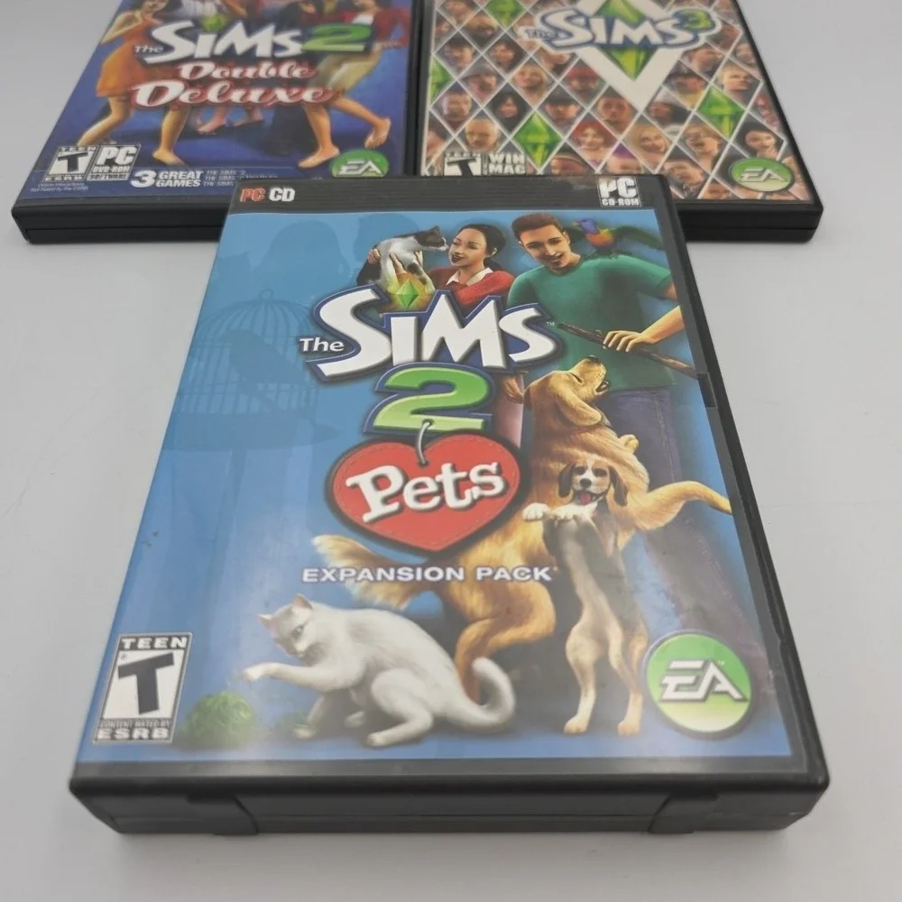 The Sims 2 Double Deluxe,Pets,& Sims 3 PC Gams Lot Of 3 Complete Windows